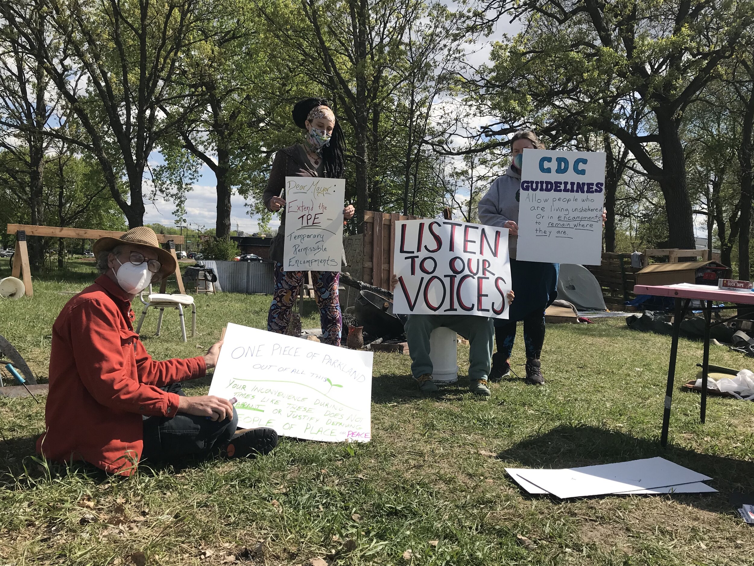 Community Action Against Reindahl Eviction (CAARE) hosted a sign-making event at the Reindahl Park encampment the day before the eviction was scheduled.