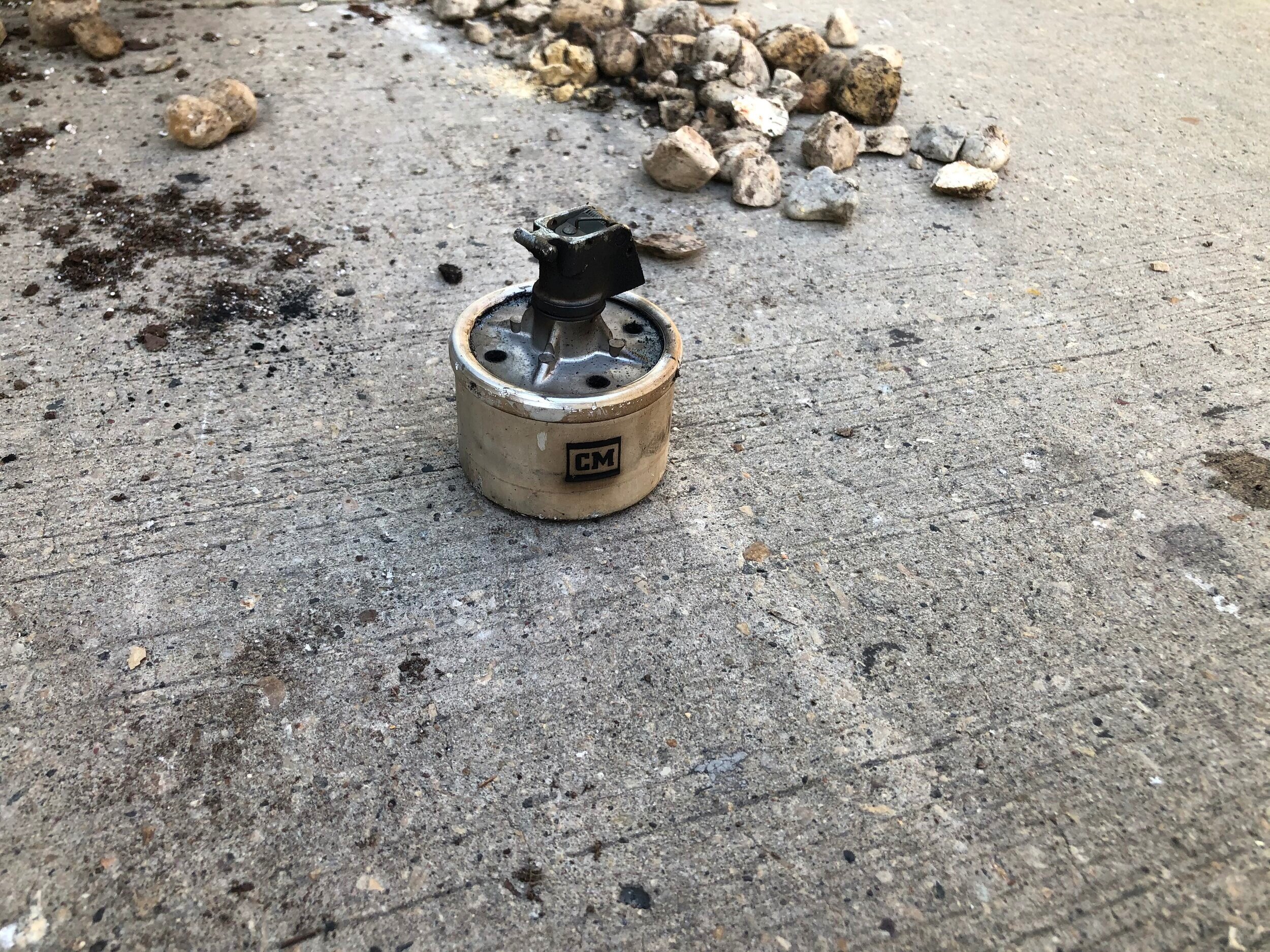 A spent tear-gas canister.