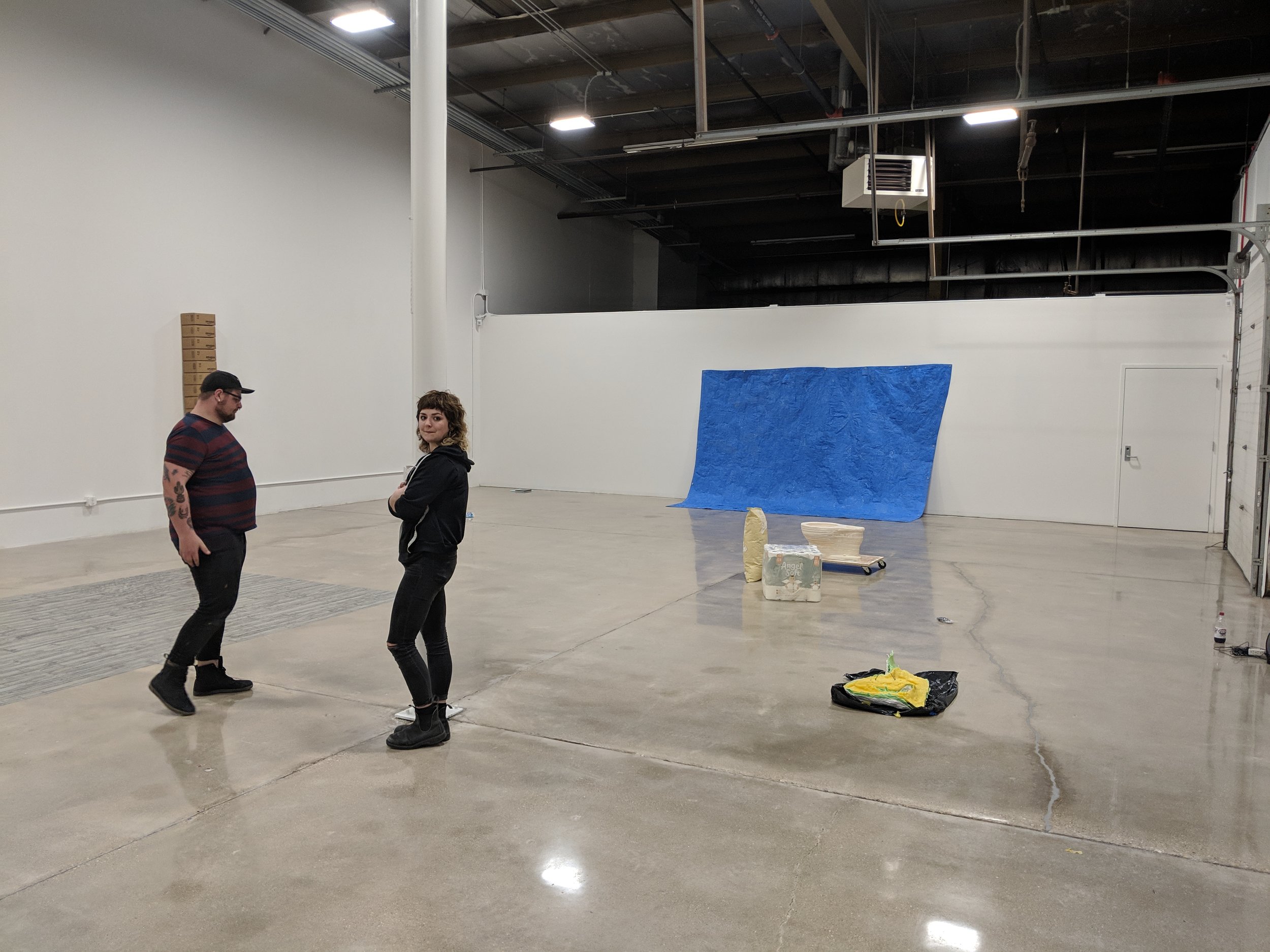 Klemens and fellow third year Sculpture MFA Eric Ford installing Klemens’ show at Backspace. Photo by Abrahm Guthrie.