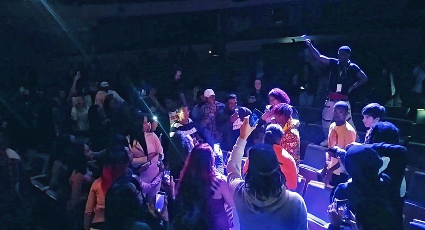 Famous Dex wanders the audience in a mostly empty Overture Hall. Photo by Michael Penn II.