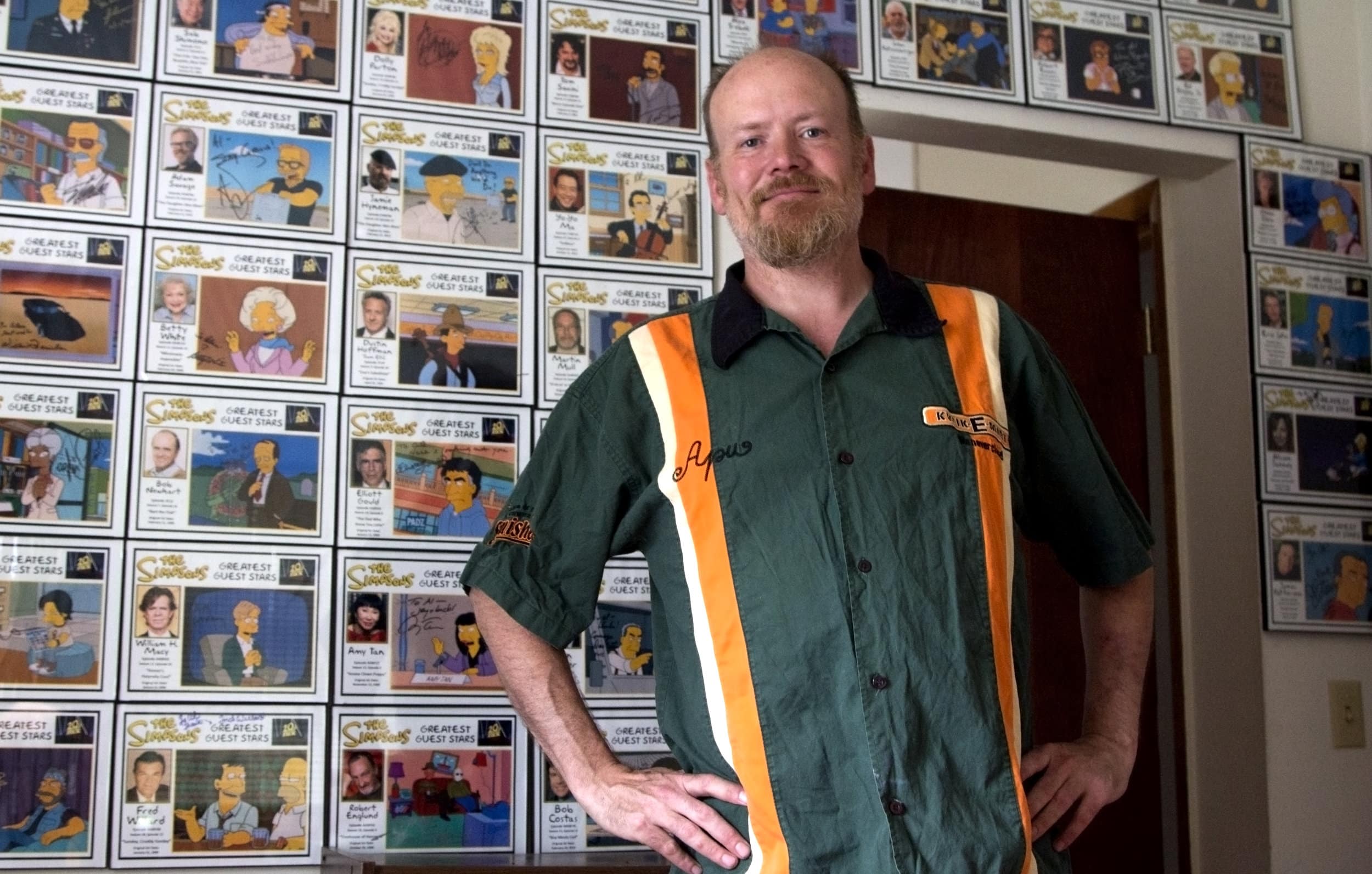 Al Hart at home with the autographs he's collected from
