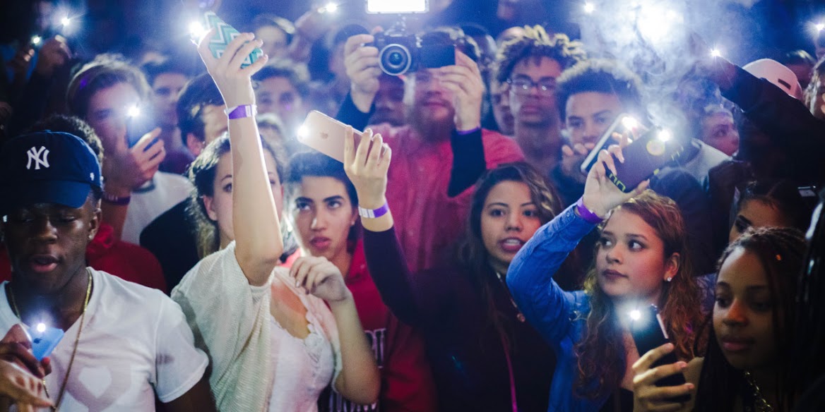 Attendees at a packed hip-hop show earlier this month at Lothlorien Co-op. Photo by dhvnsen.