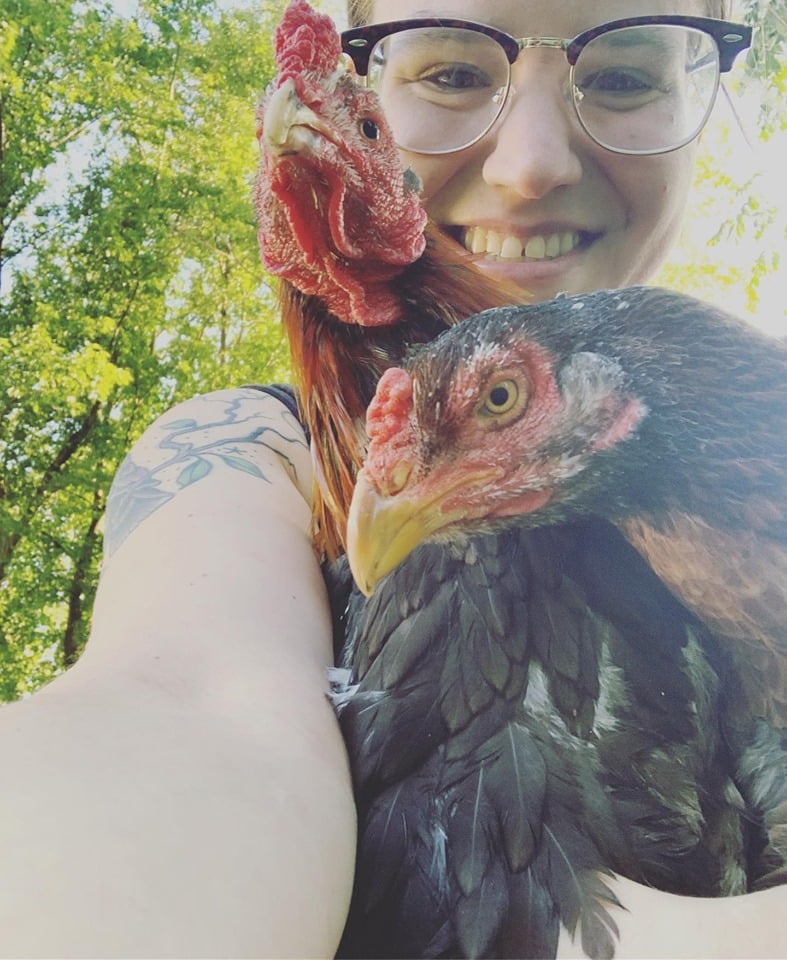 Quincy Markowitz with two of Farm Bird’s chickens, Reuben and Rosa.