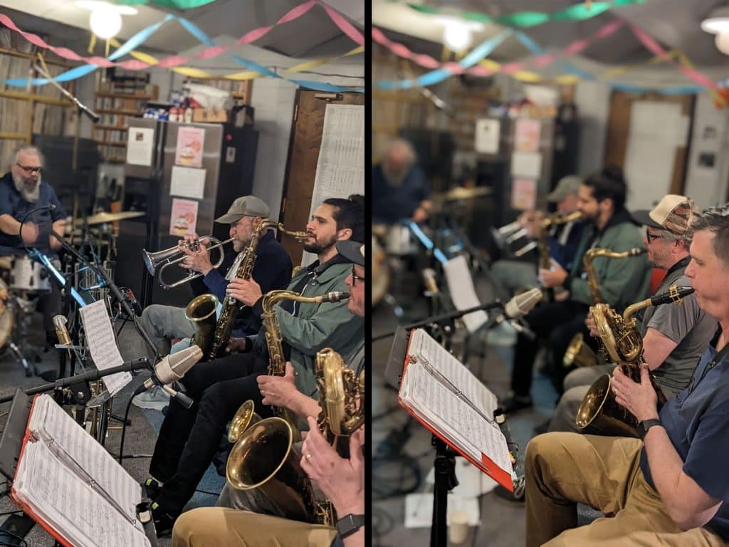 Two photos set side-by side show a group of musicians playing saxophones, trumpets, and drumkit in the vinyl library of a radio station. They are photographed from the side and are sitting in a row, with music stands and sheet music in front of them. Colorful streamers hanging from the ceiling are visible at the top of the image.