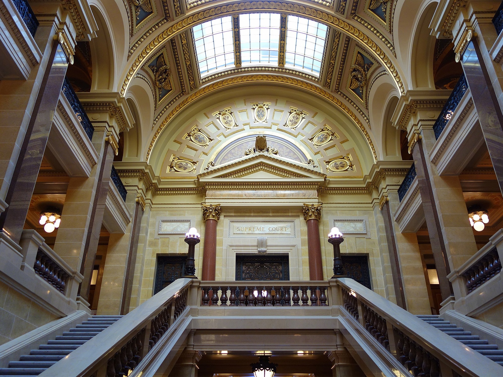 Photo shot from below of the entrance to the Wisconsin Supreme Court.
