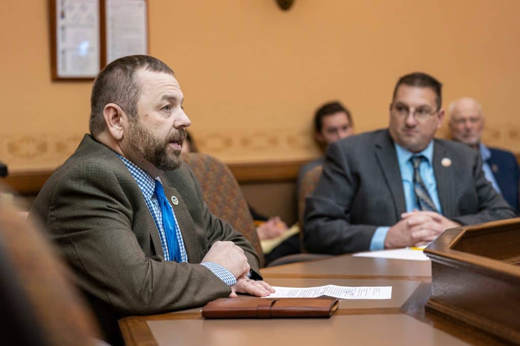 Profile view of AV Roth speaking before the committee.