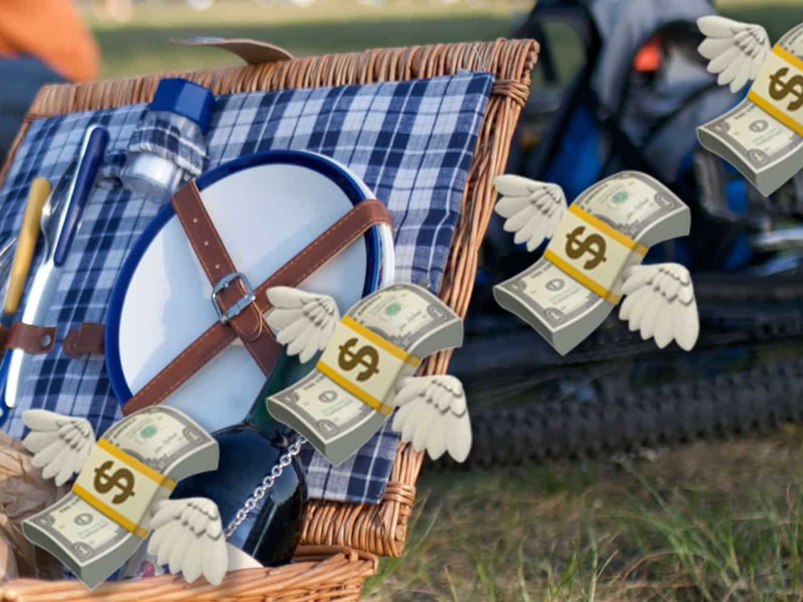 A photo illustration shows a picture of an open picnic basket. In the foreground, several emojis depicting bundles of cash with wings are arrayed diagonally across the image.