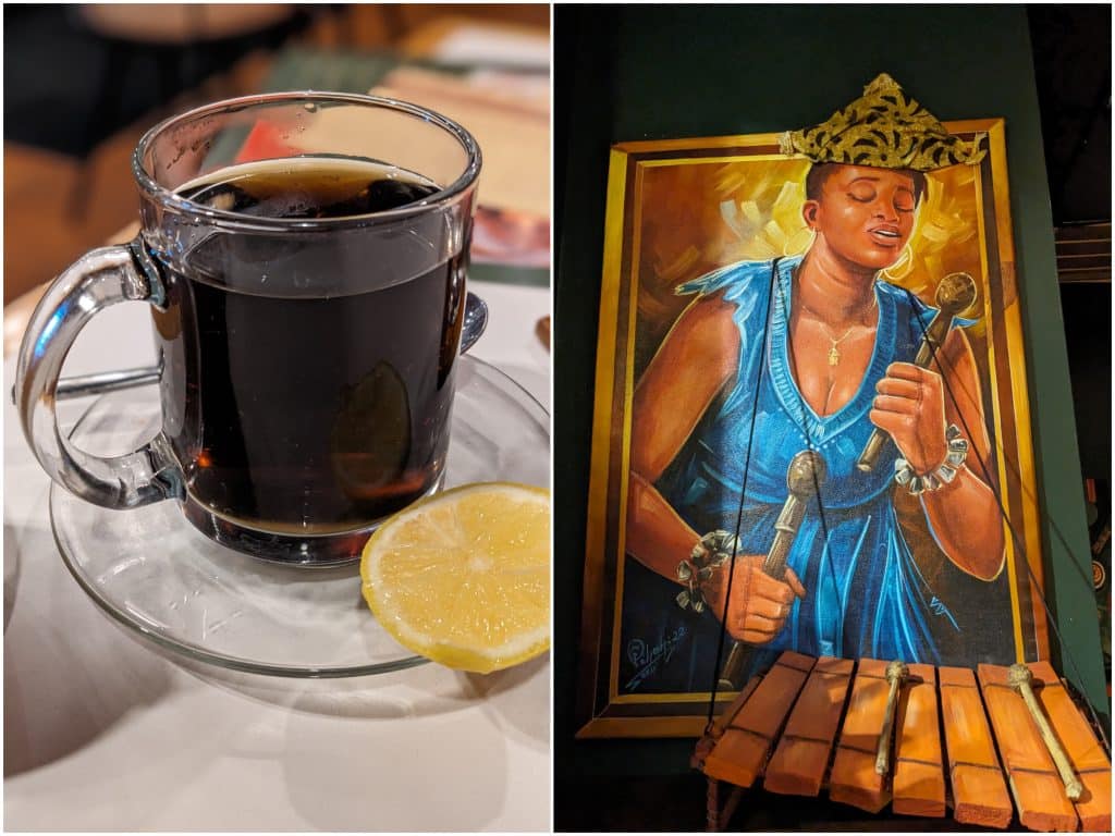 A simple image collage that pairs two vertically-oriented photos. On the left, a glass mug of darkly colored tea with a lemon slice on a saucer. On the right, a large, lavish painting of of a woman in a blue dress and gold headscarf playing a West African xylophone that's mounted on the wall below the painting.