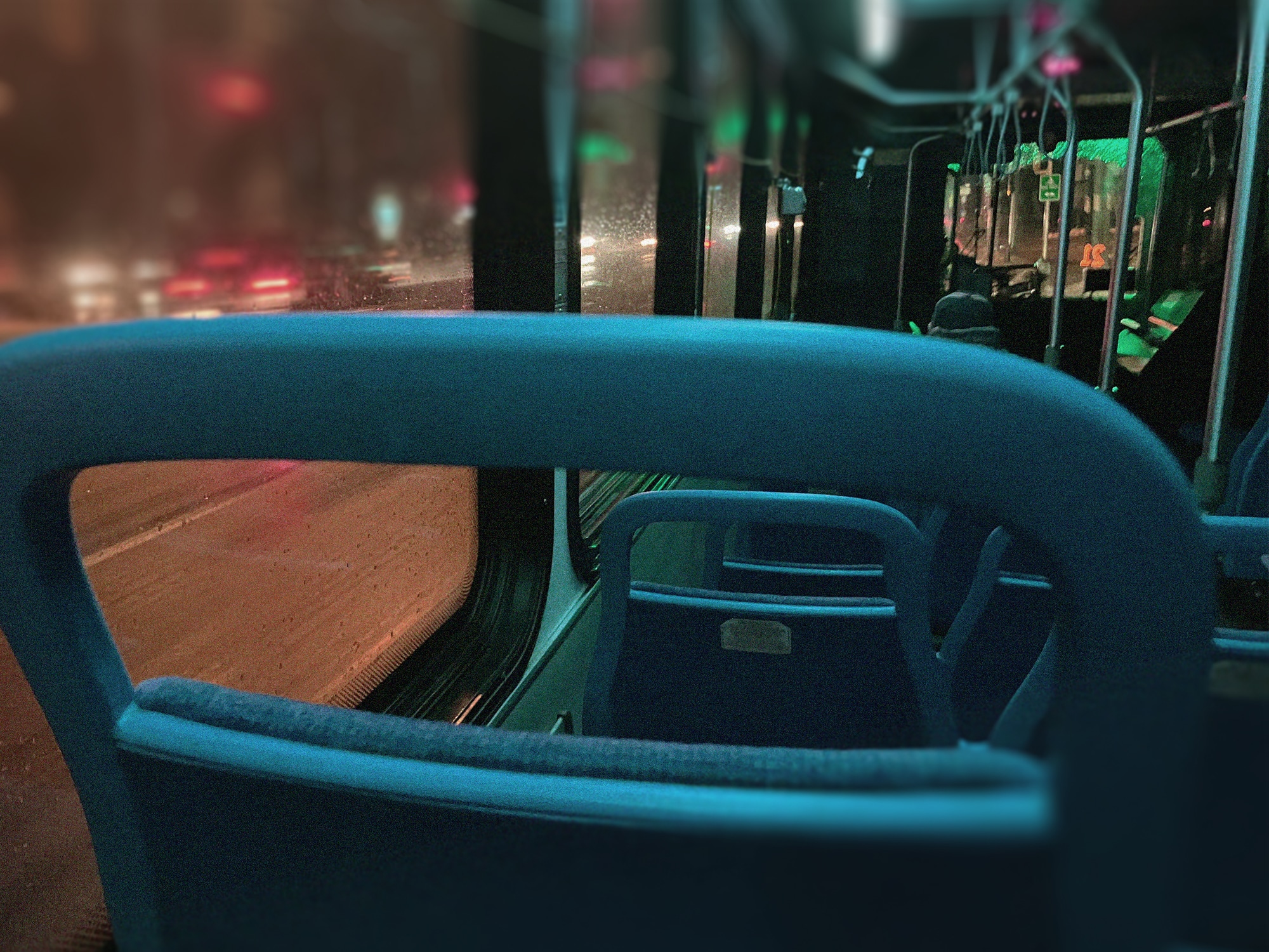 Photo of the interior of a Madison metro bus at night.