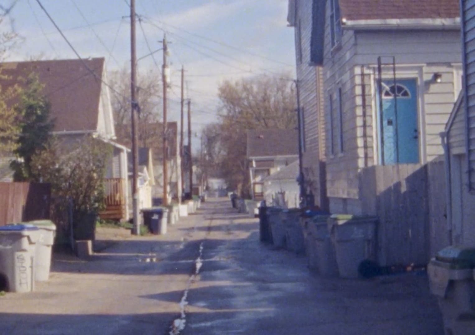 “The Year” presents a prosaic alleyway as a poetic gateway